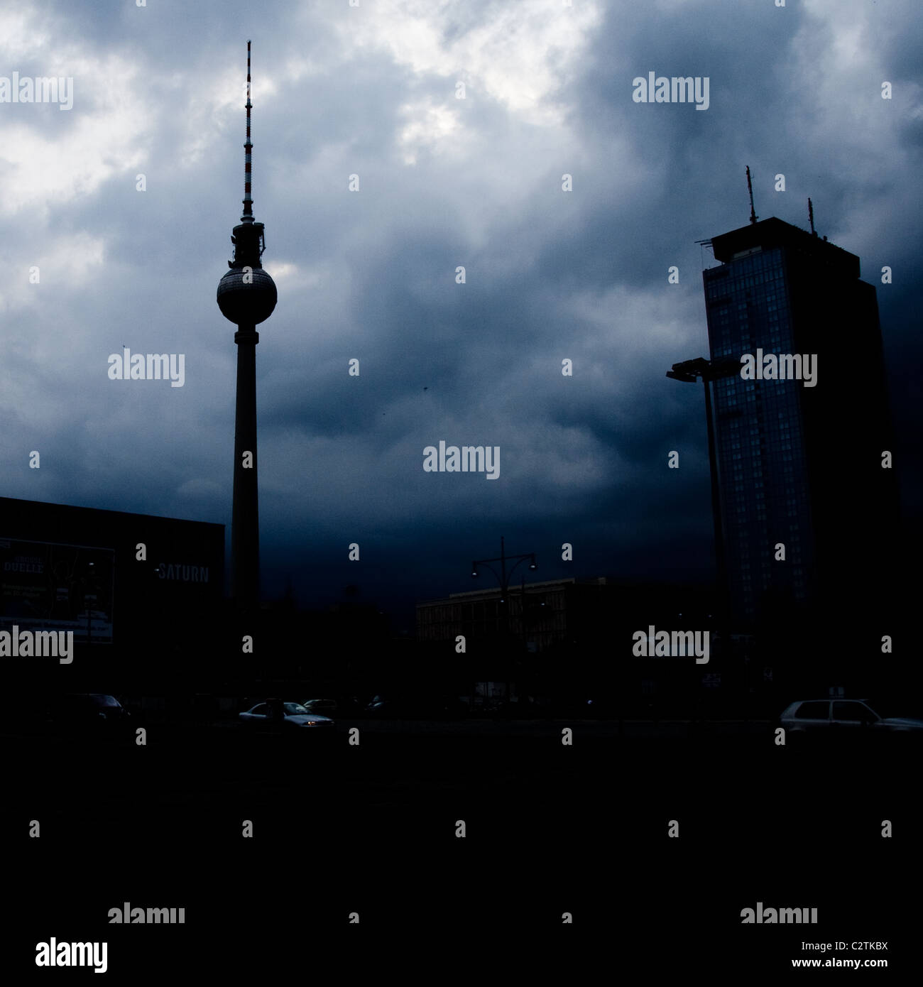Dark skies around the TV tower at alexanderplatz in Berlin Stock Photo