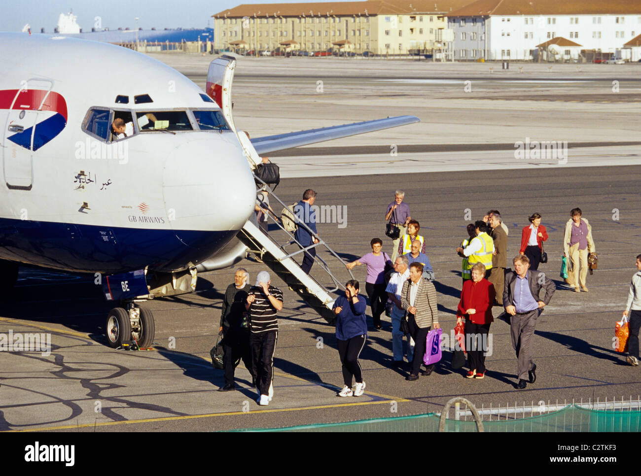 Passengers disembarking from a British Airways aeroplane at Gibraltar airport Stock Photo