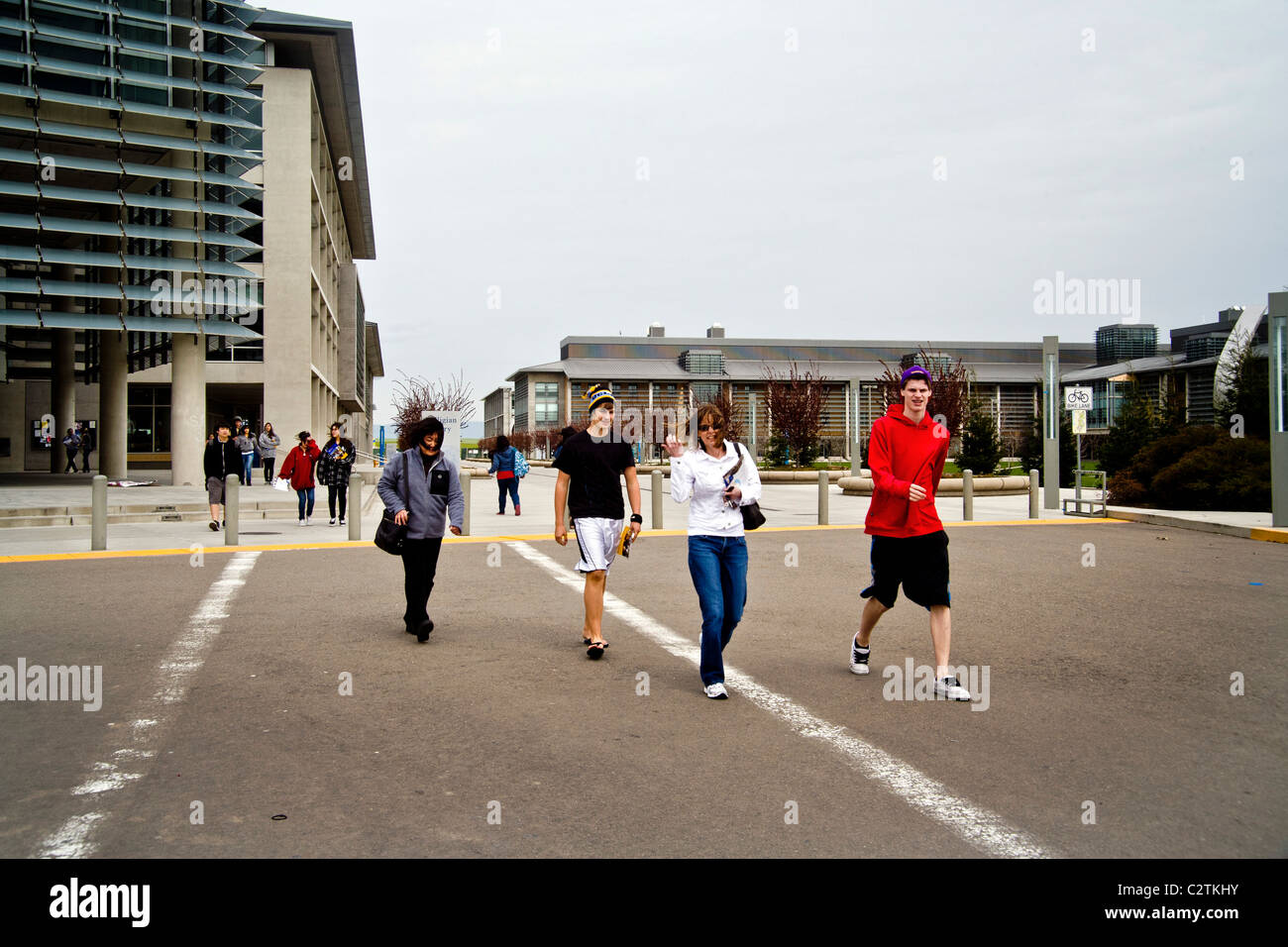 Students stroll outside the Leo and Dottie Kolligian Library at the University of California, Merced. Stock Photo