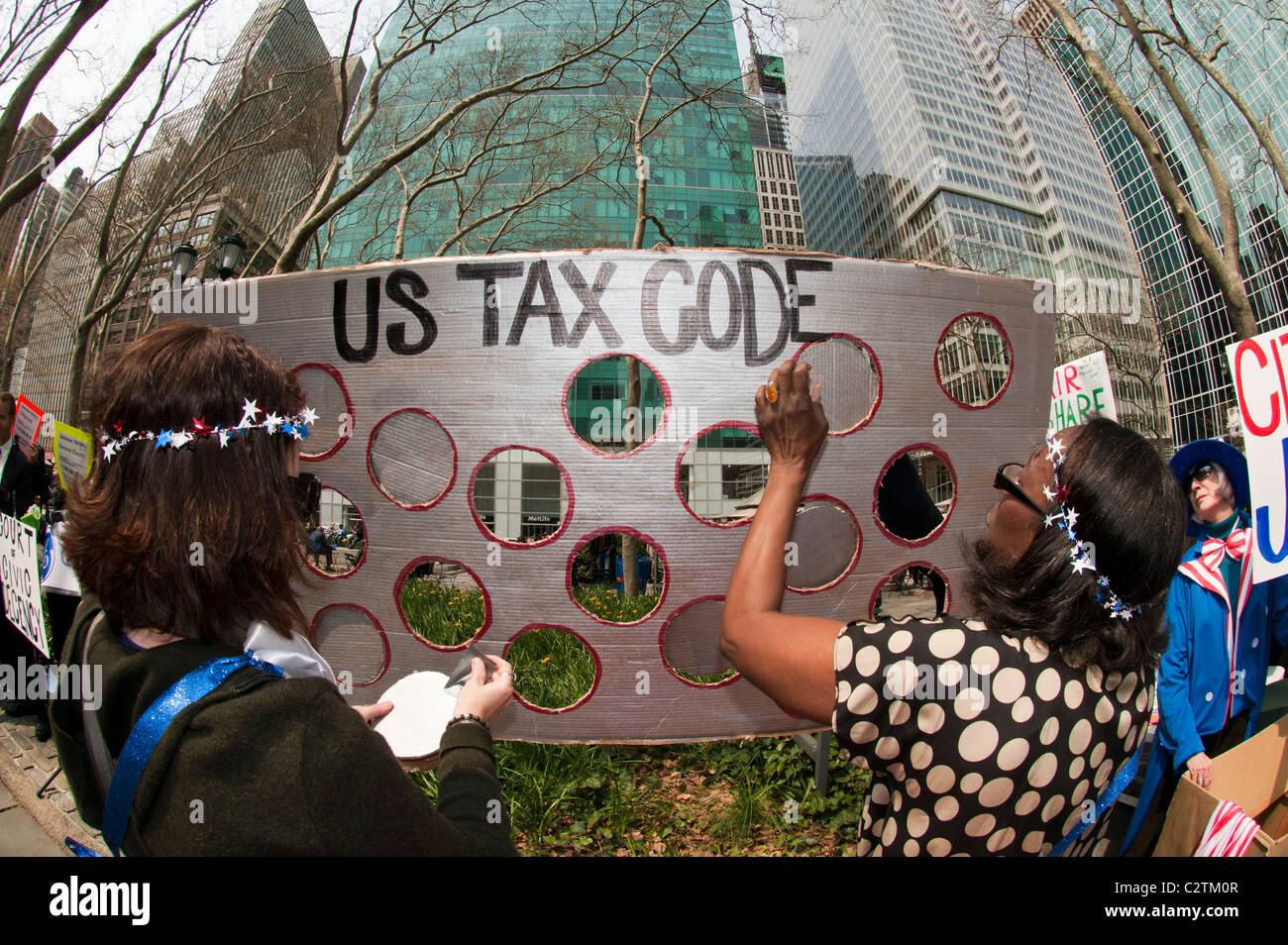 Protesters from Moveon.org and other groups plug loopholes in the tax laws during a mock trial for corporations Stock Photo