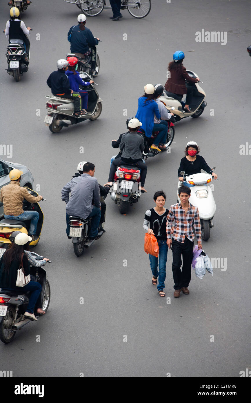 Busy road scene in the Old Quarter of Hanoi Stock Photo