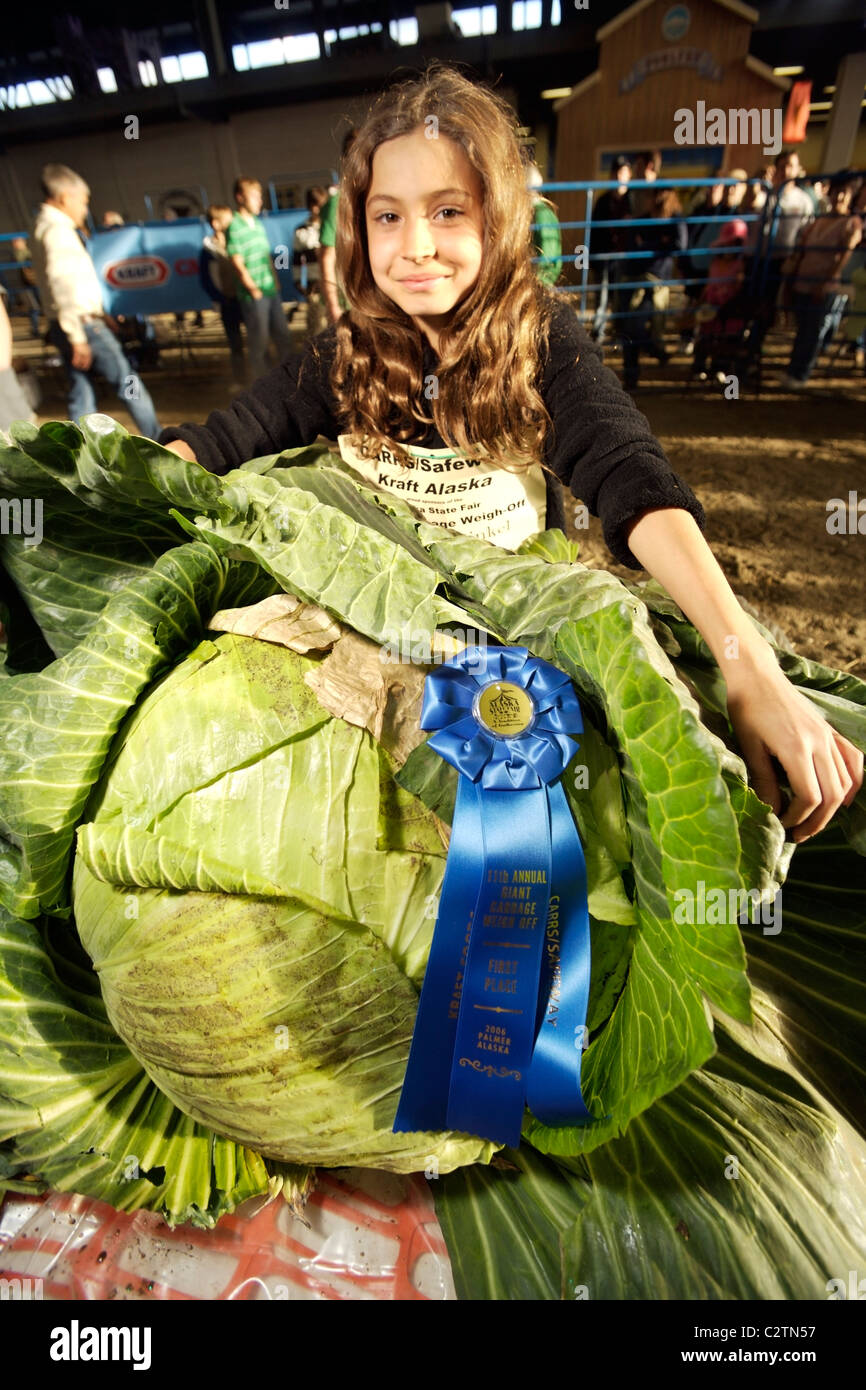 Young girl with first place giant cabbage at Alaska State Fair Palmer Alaska Stock Photo