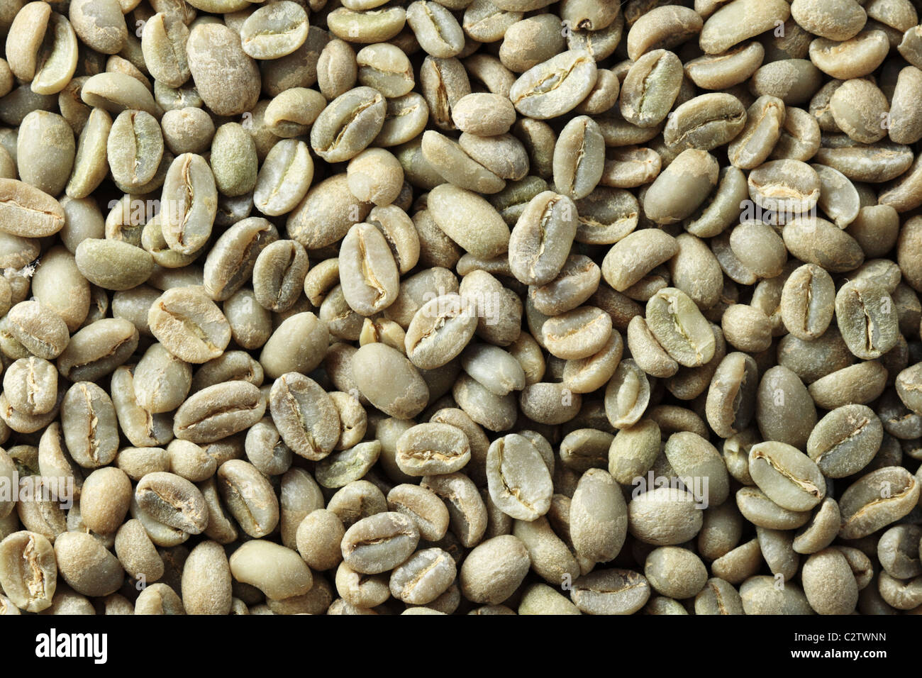 Ethiopian organic Yirga Cheffe green coffee bean background Stock Photo