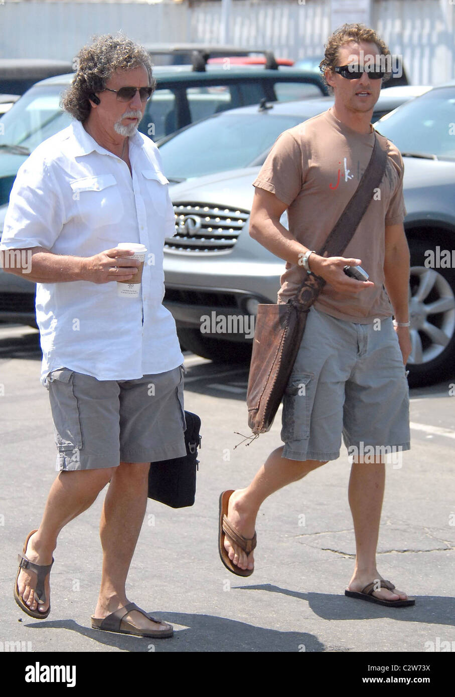 Matthew McConaughey and a friend walk to a movie studio Los Angeles