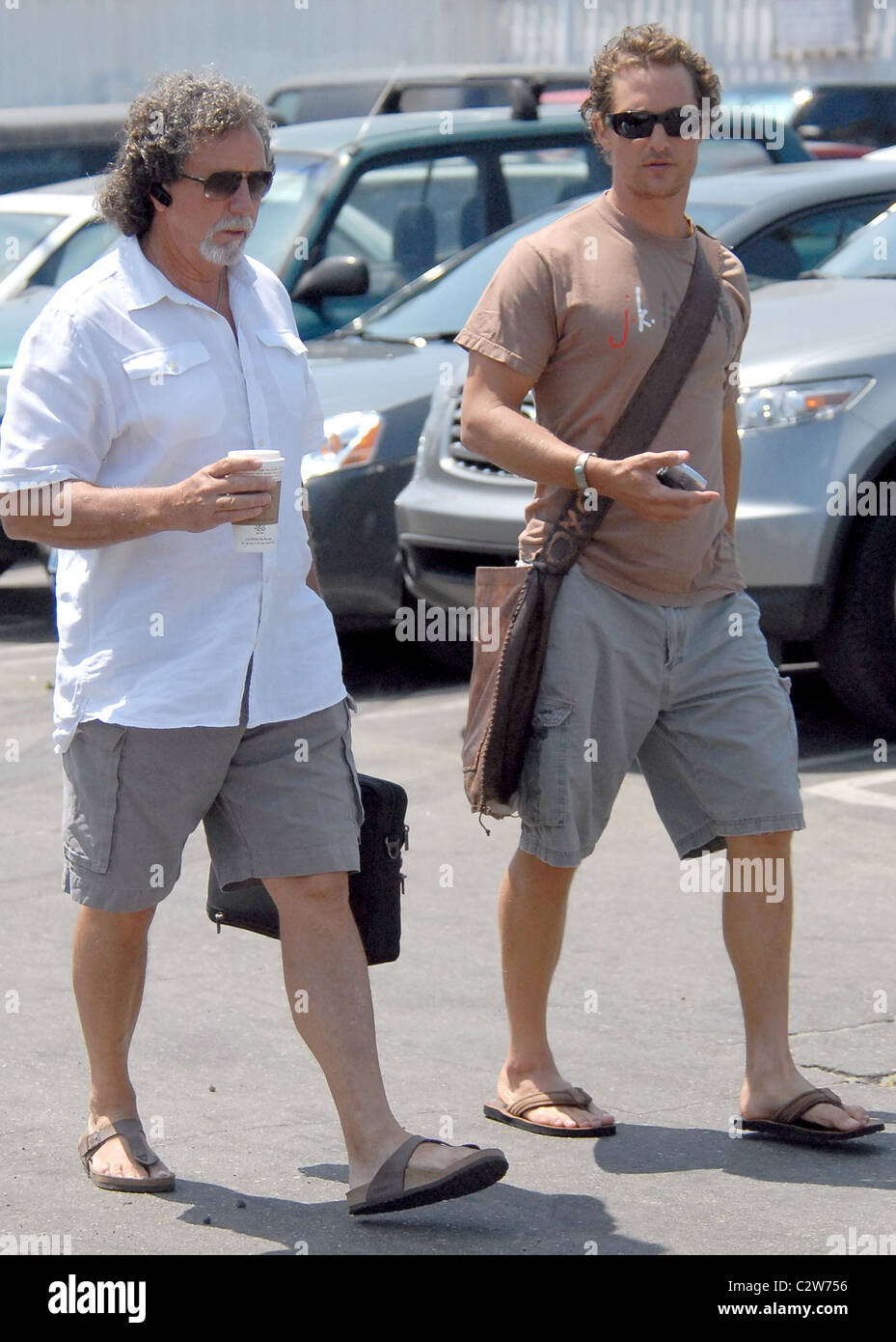 Matthew McConaughey and a friend walk to a movie studio Los Angeles