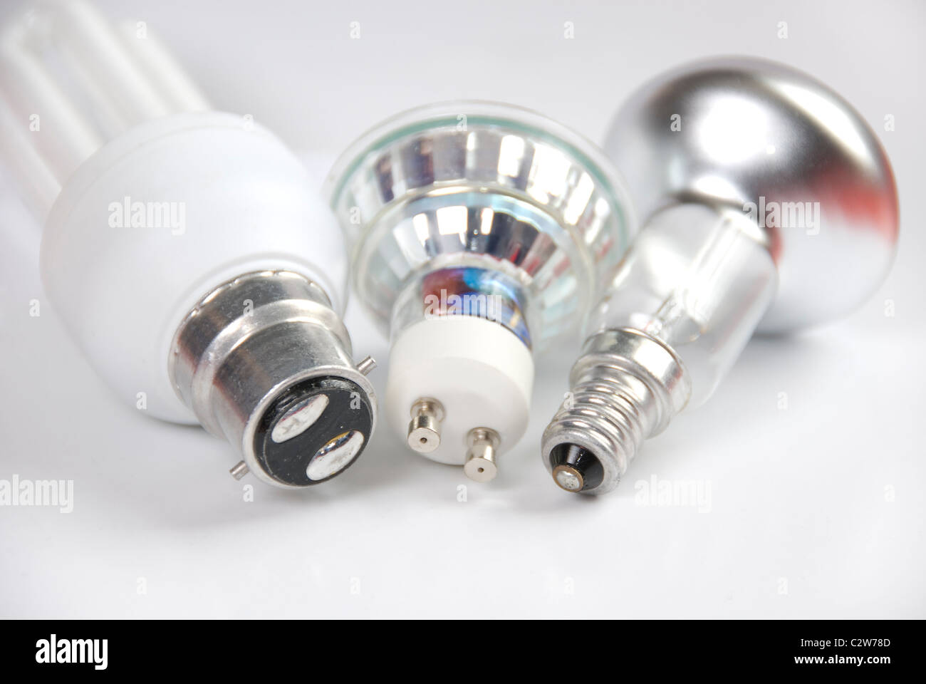 Different types of light bulb caps, Bayonet cap(BC) push and twist, Edison screw cap(ES), Halogen twist and lock, United Kingdom Stock Photo