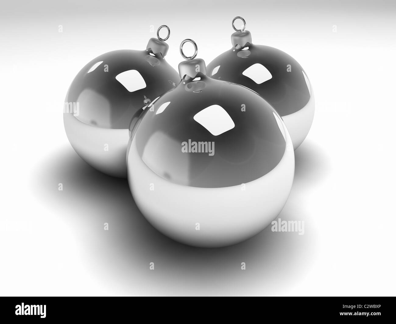 Three silver christmas bulbs with silver hangers, 3d render Stock Photo