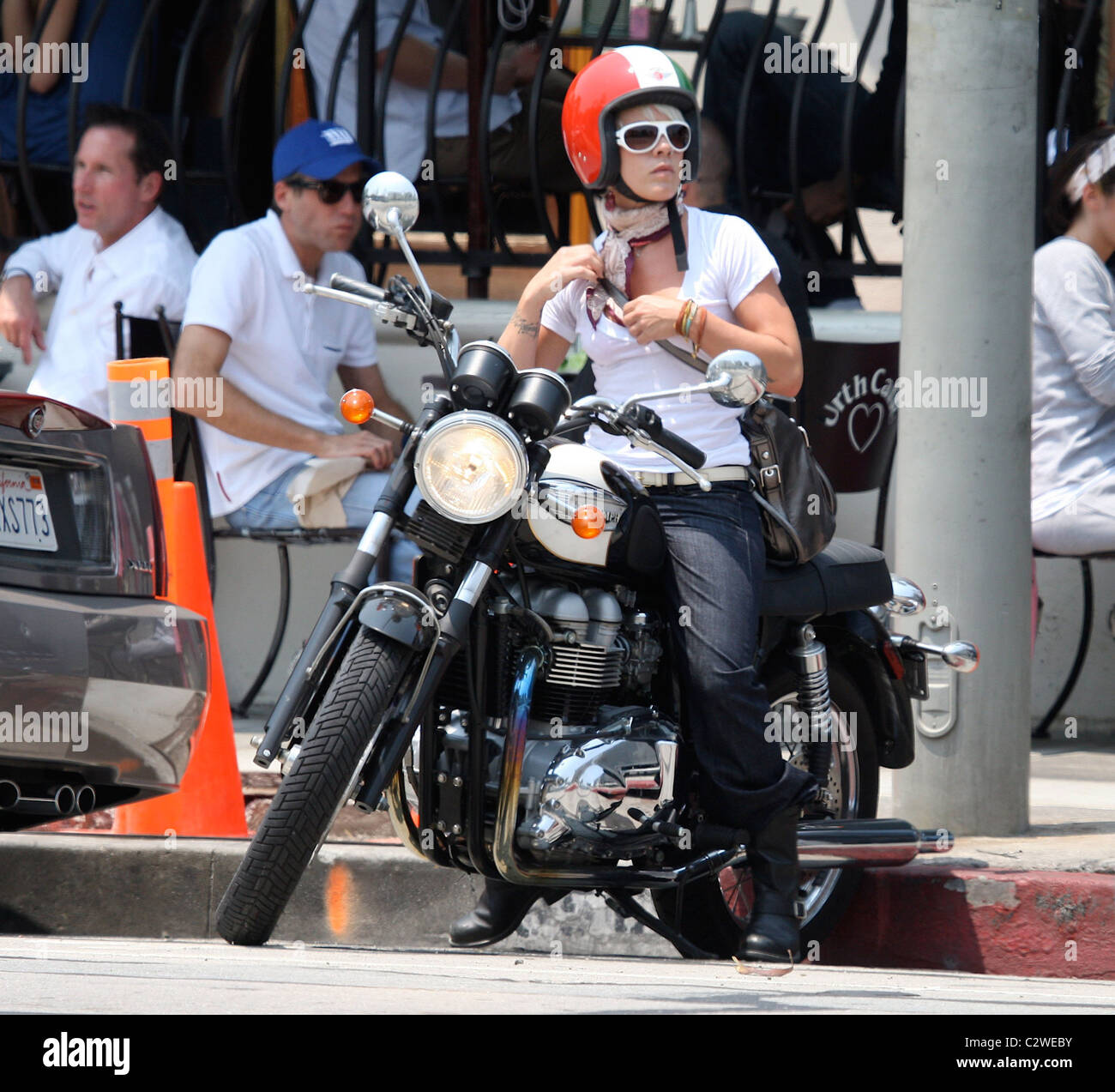 Pink on her motorcycle after having lunch at the Urth Caffe in West ...