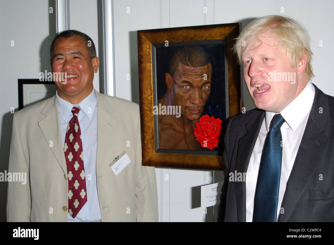 Boris Johnson & Mr Keene the painter Unveiling of portrait of James Oyebola at the City Hall. The British heavyweight champion Stock Photo