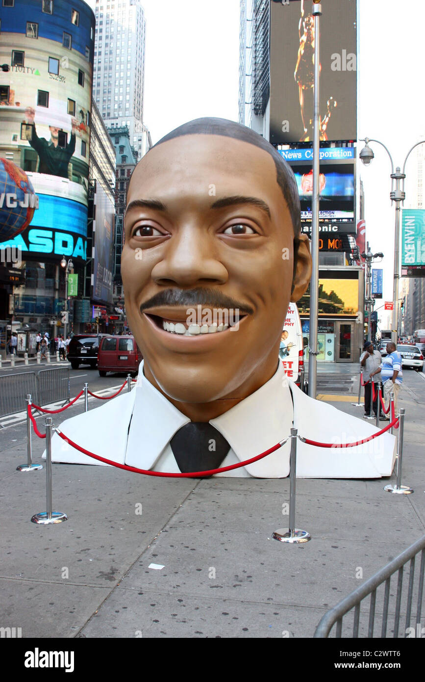 A 15 foot tall replica of Eddie Murphy's head is placed in Times Square ...