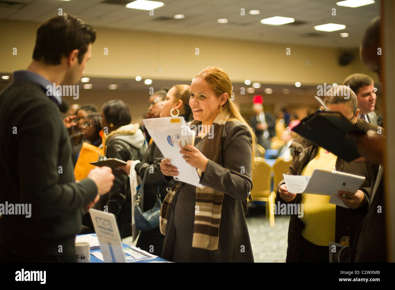 Job seekers line up for a job fair in midtown in New York on Monday, April 18, 2011. ( © Frances M. Roberts) Stock Photo