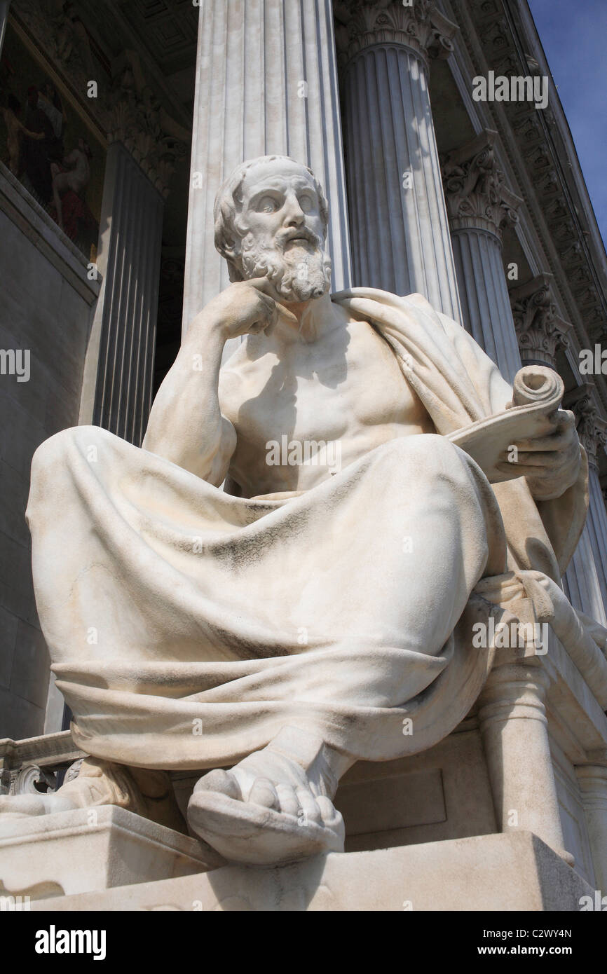 Austria, Vienna, Statue of Greek philosopher Herodotus in front of the Parliament building. Stock Photo