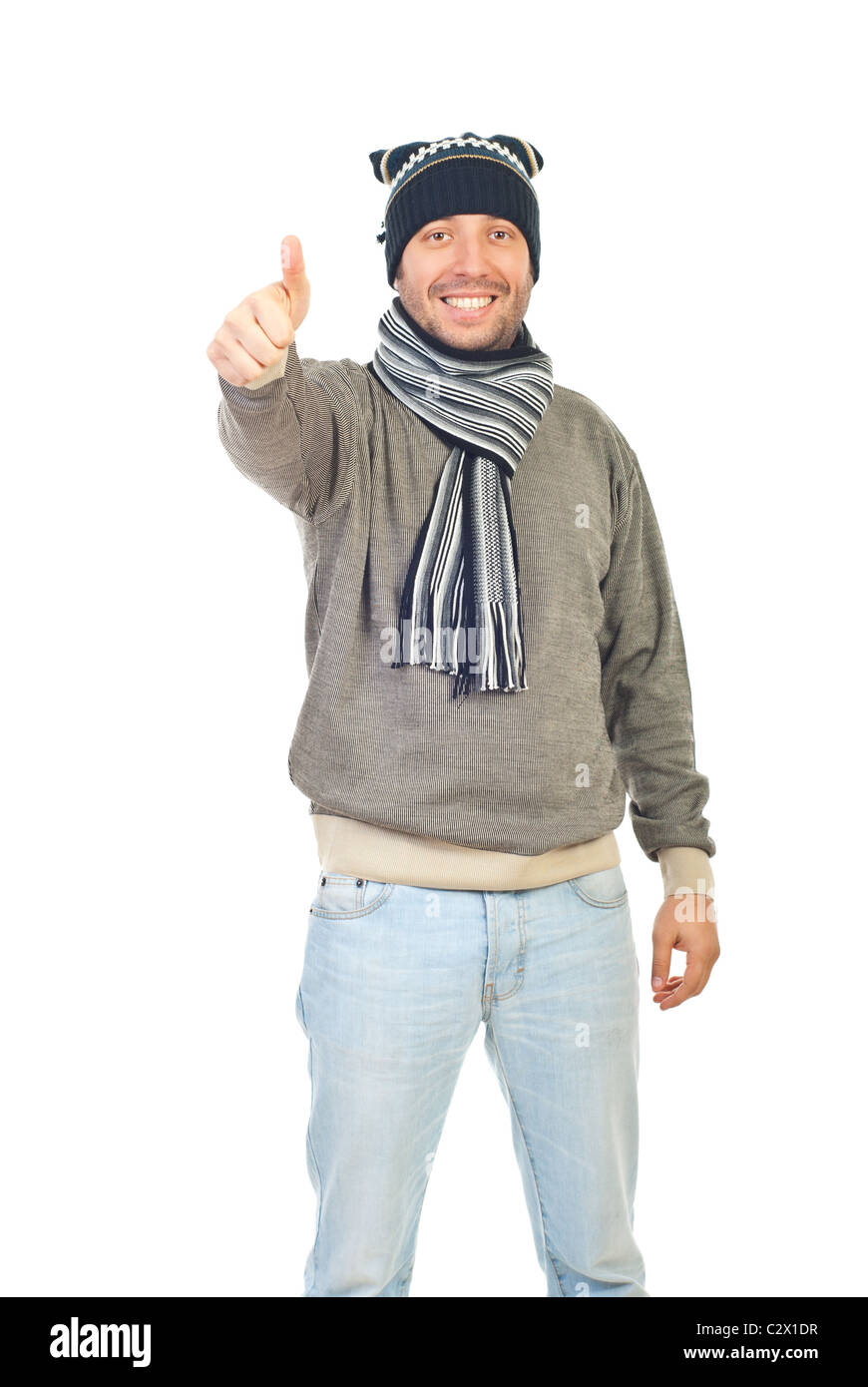 Handsome Winter Guy With Knit Cap And Scarf Giving Thumbs Up Handsome Winter Guy With Knit Cap And Scarf Giving Thumbs Up