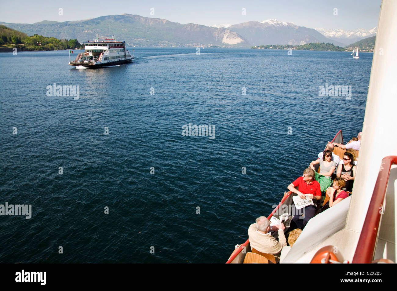 Car ferries pass on Lake Maggiore Stock Photo
