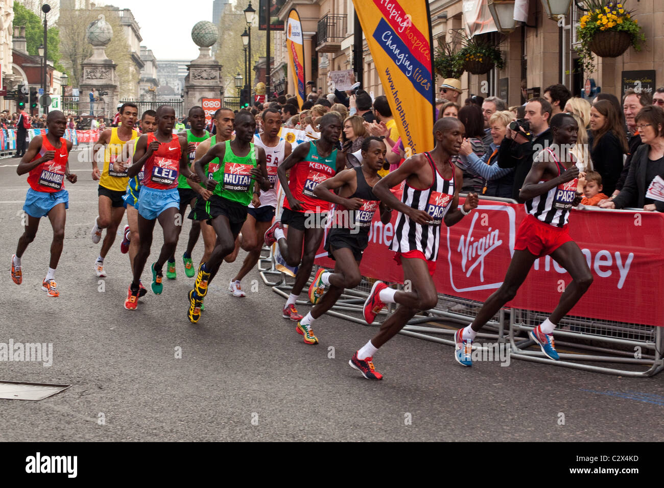 Mens elite runners at the London Marathon 2011,Church Street, Greenwich London, England, United Kingdom. Stock Photo