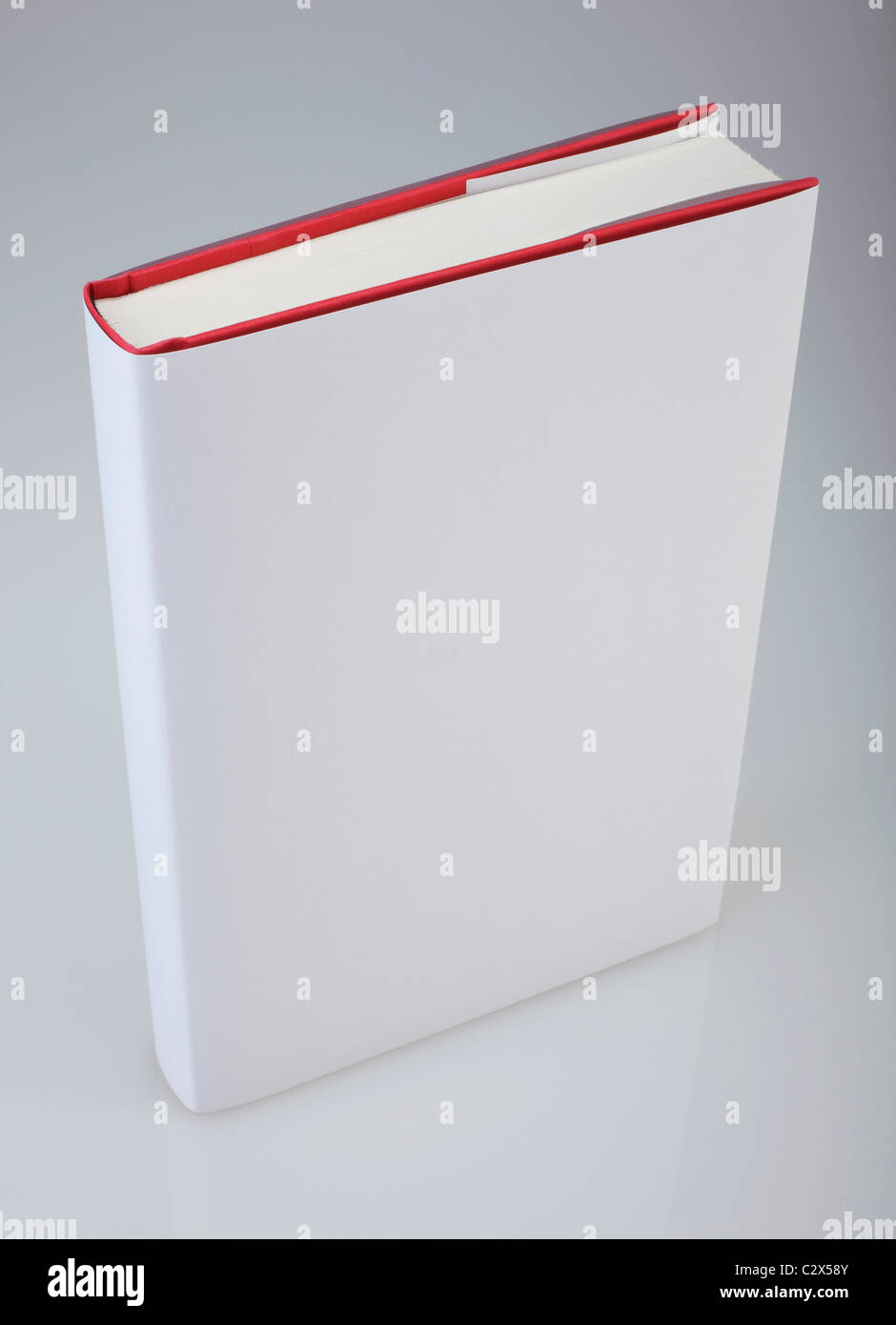 Hardcover book with plain, white cover for design layout Stock Photo