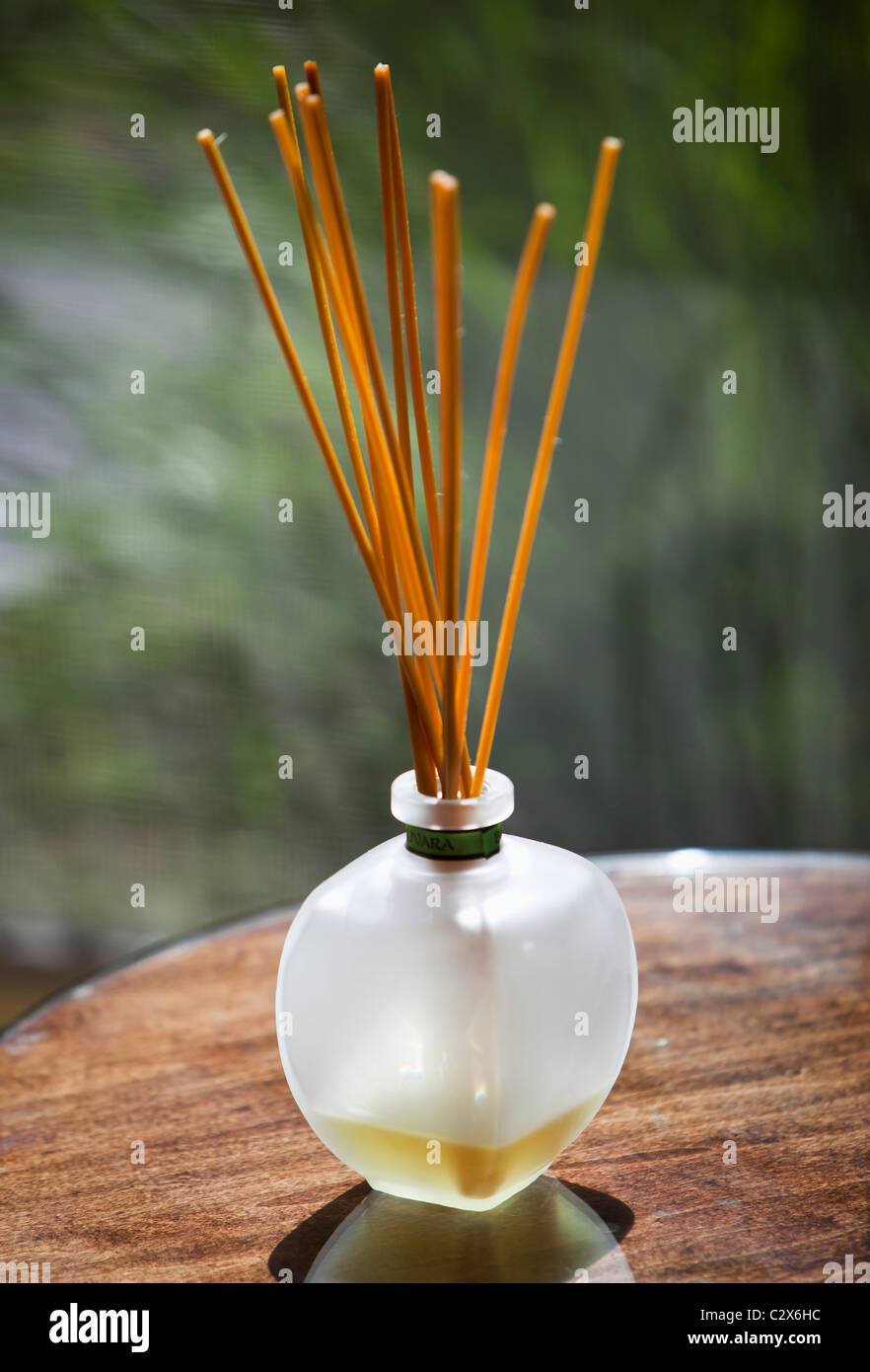 Sticks of incense in glass jar Stock Photo - Alamy
