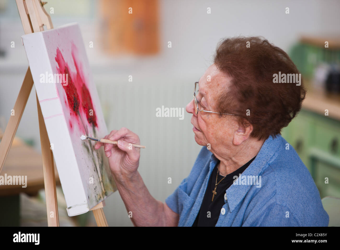 Painting senior citizen Stock Photo Alamy