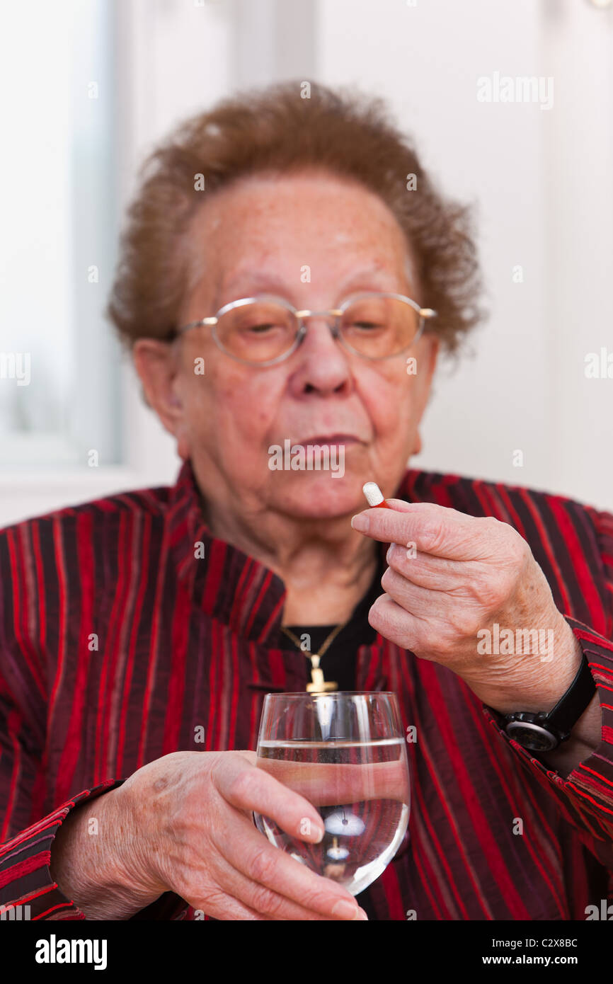 Senior Woman with tablets Stock Photo