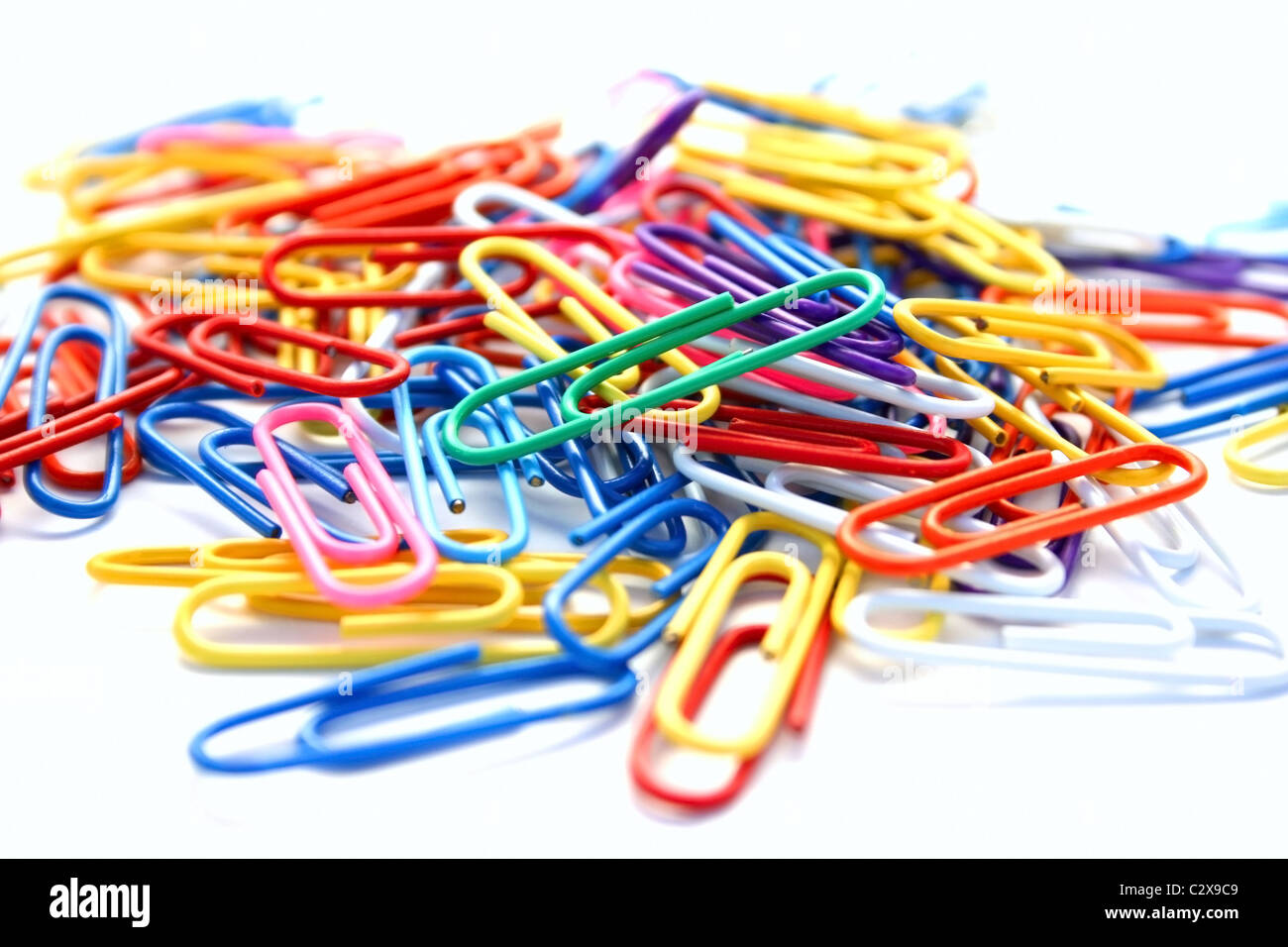 Many colorful paper clips on white background Stock Photo Alamy