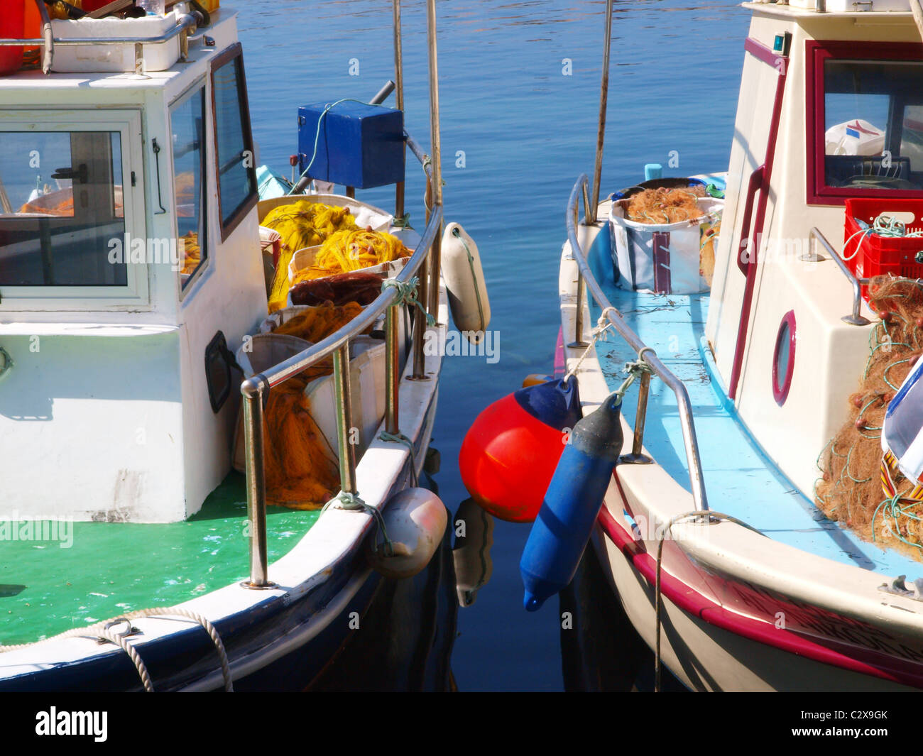 A couple of fishing boats moored in harbour,  Coral Bay, Cyprus, Stock Photo