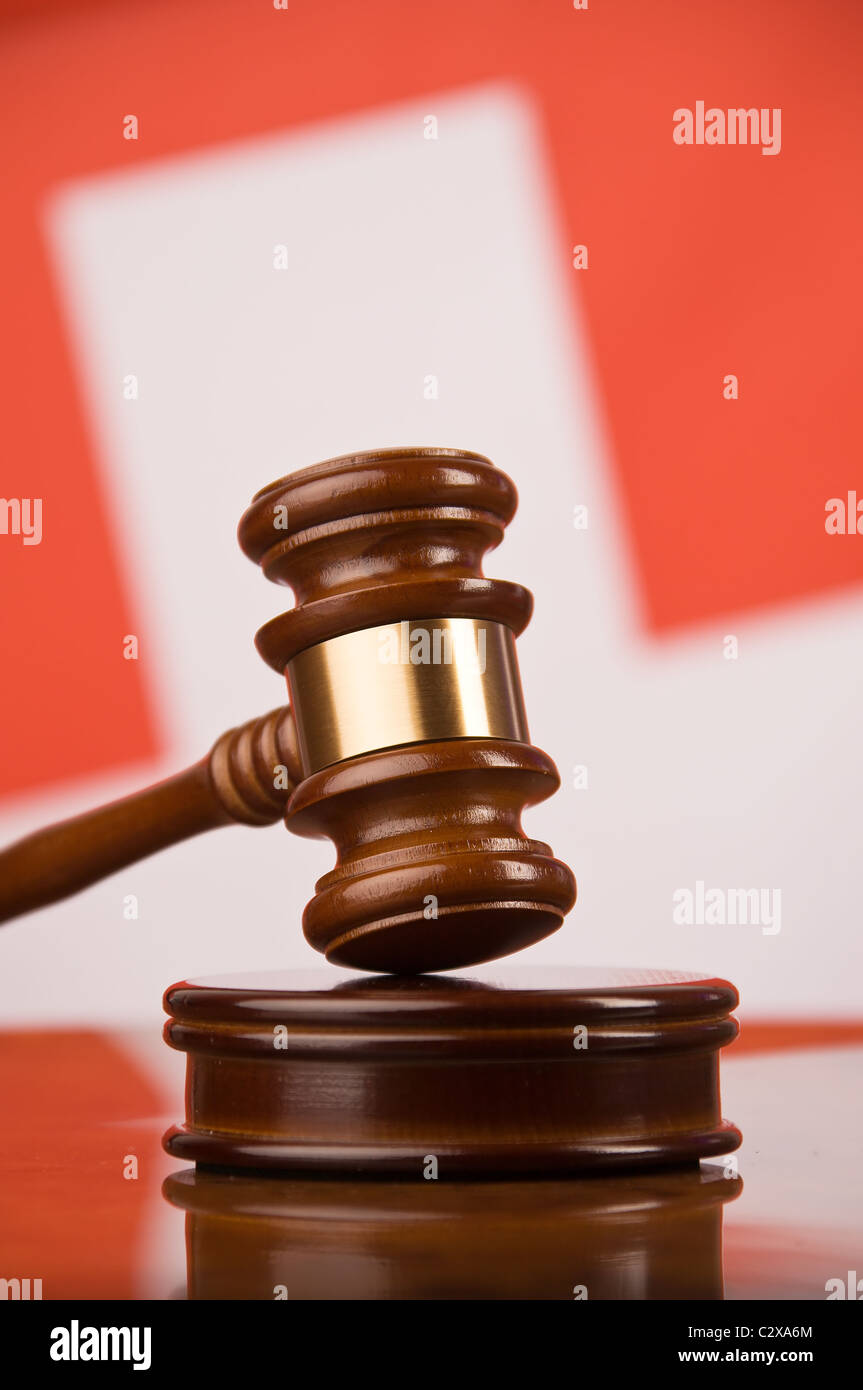 Court Hammer and Swiss flag Stock Photo