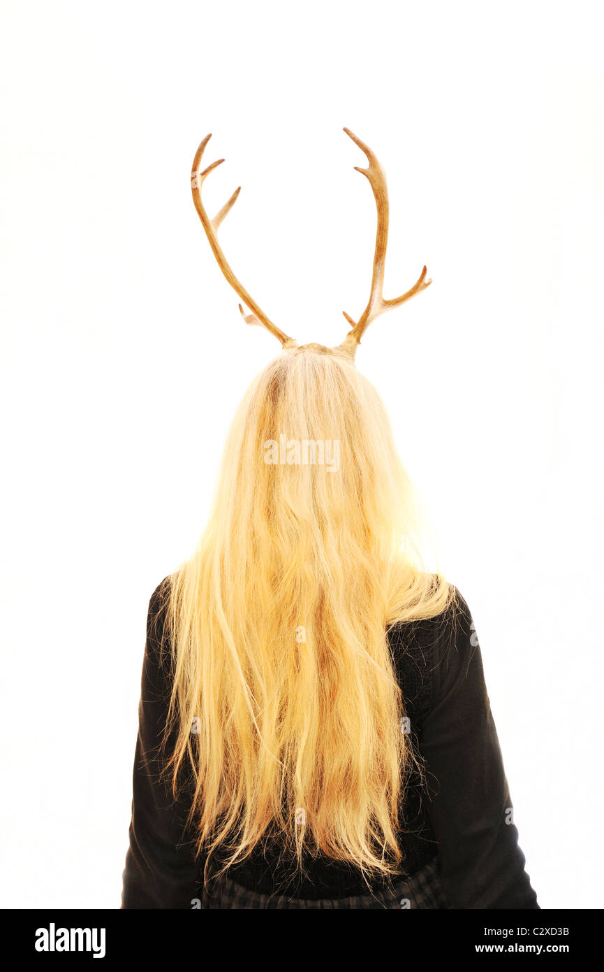 Woman with horns on head Stock Photo Alamy