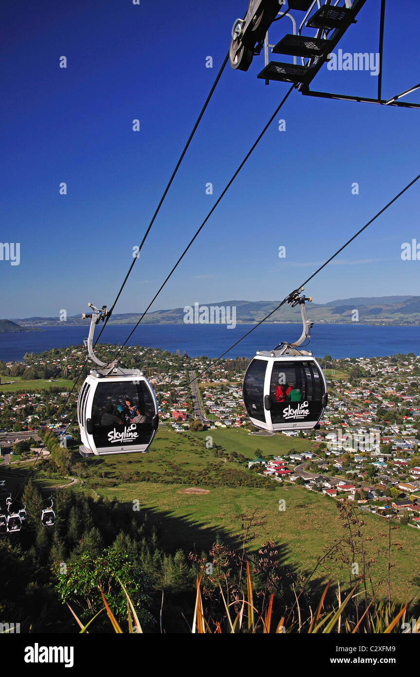 Skyline Skyrides Gondola above city and Lake Rotorua, Rotorua, Bay of Plenty Region, North Island, New Zealand Stock Photo