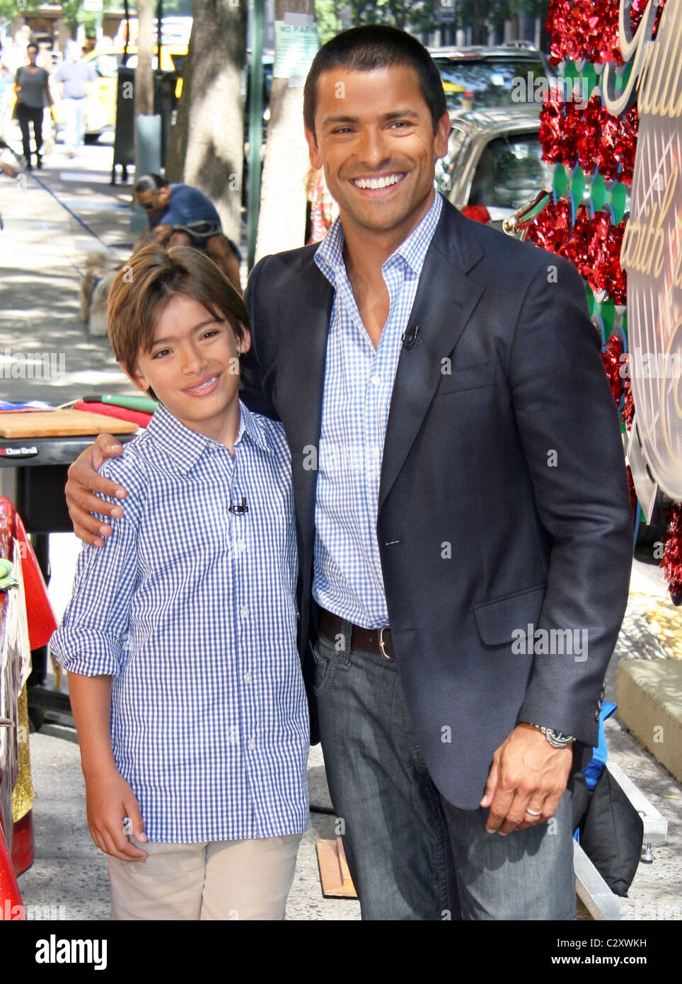 Michael Consuelos and father Mark Consuelos filming the segment 'Grilling with the Stars' on ABC