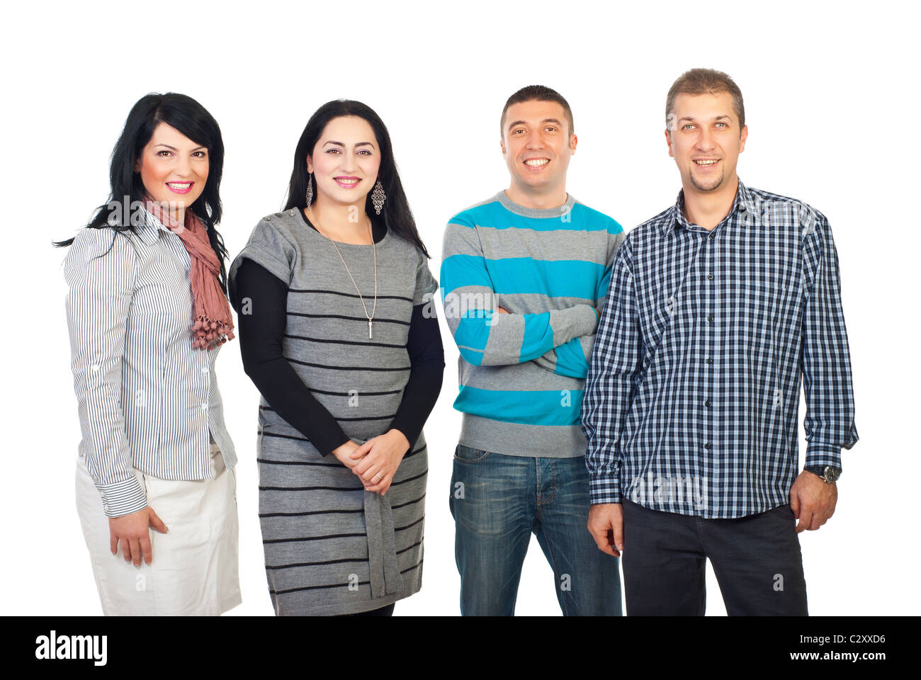 Happy group of four people standing in a row isolated on white background Stock Photo
