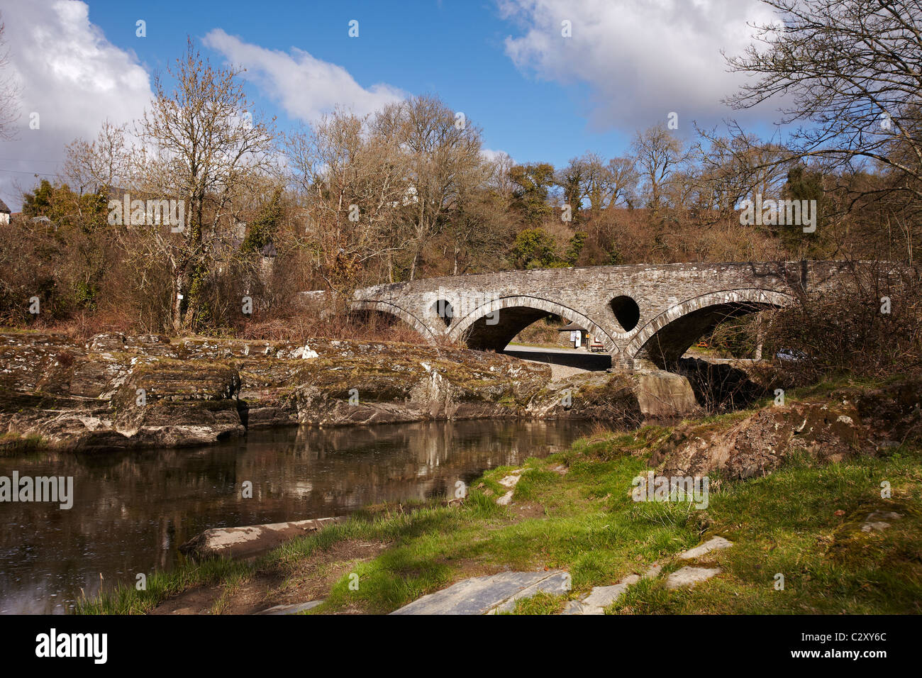 Ancient Bridge over the river Teifi, Cenarth, Wales, UK Stock Photo