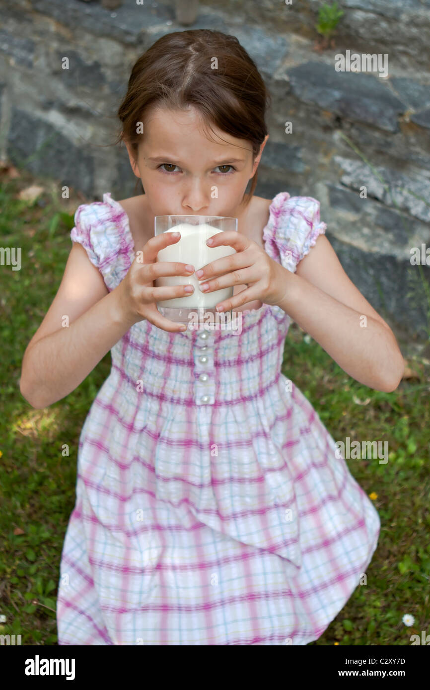 girl is drinking milk Stock Photo