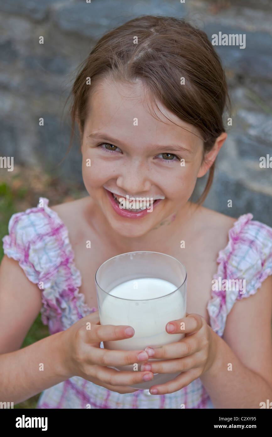 girl is drinking milk Stock Photo