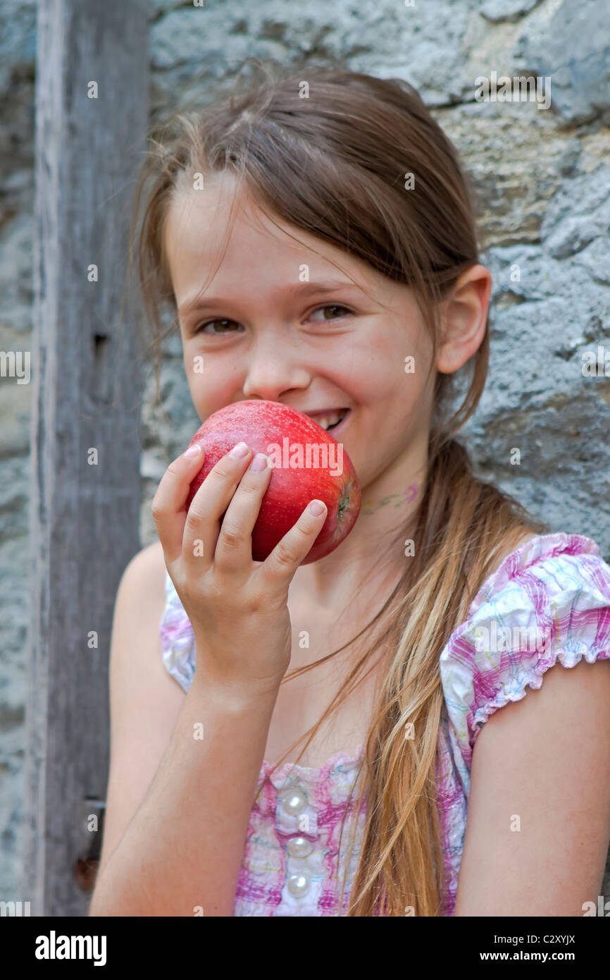 girl is eating fruits Stock Photo