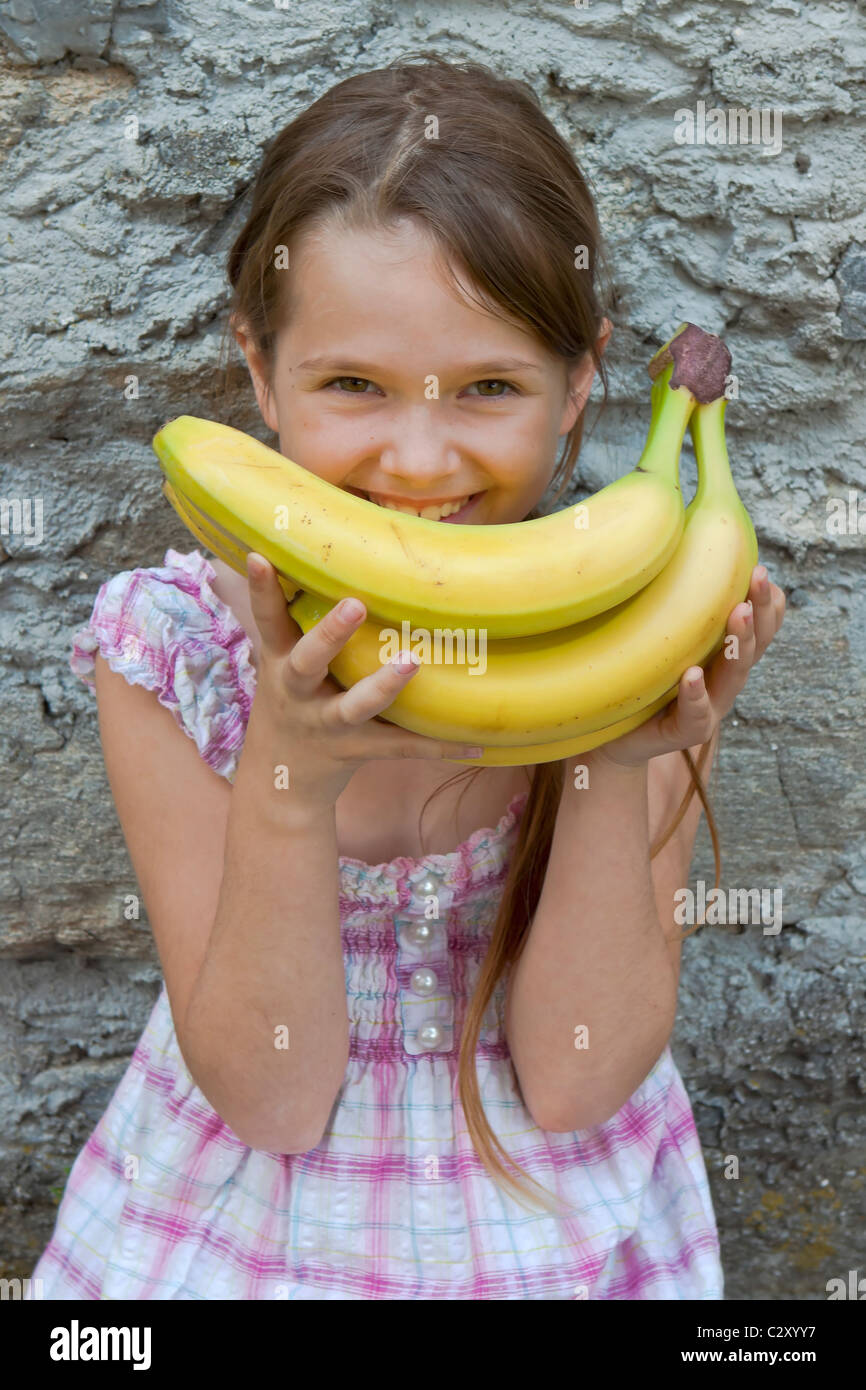 girl is eating fruits Stock Photo Alamy