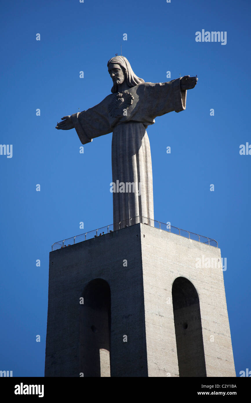 The statue of Jesus Christ (Christus Rei) in at Almada on the opposite ...