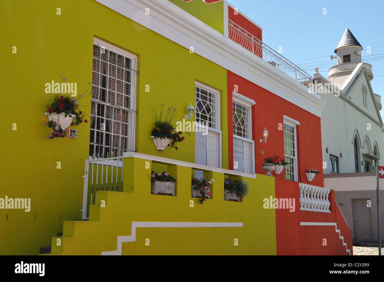 Extremely bright and colorful houses in the Bo-Kaap area in Cape Town, South Africa Stock Photo