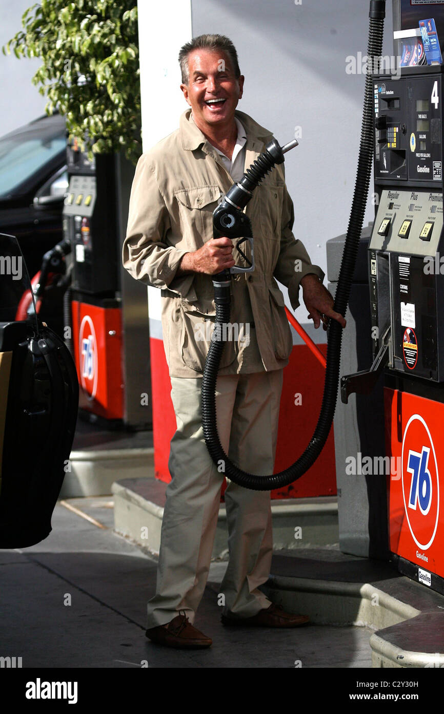 Hamilton fills up his car with gas at a 76 gas station Los