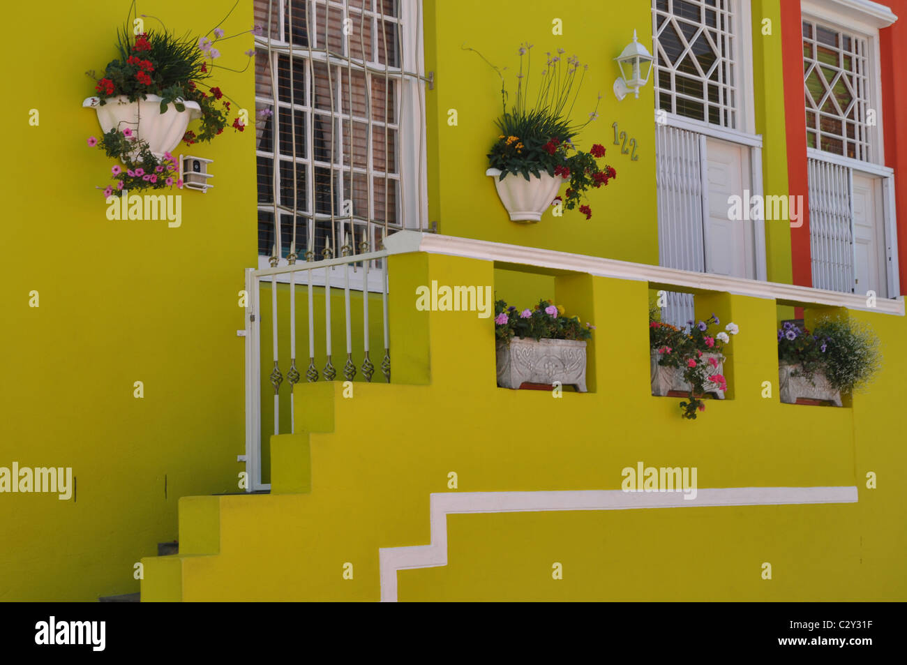 Extremely bright and colorful houses in the Bo-Kaap area in Cape Town, South Africa Stock Photo