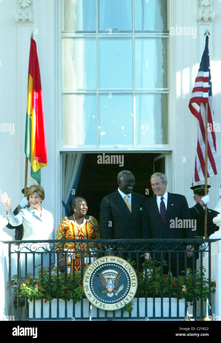 First Lady Laura Bush, Theresa Mensah, Pesident of Ghana John Kufuor and President George Bush participate in the South Lawn Stock Photo