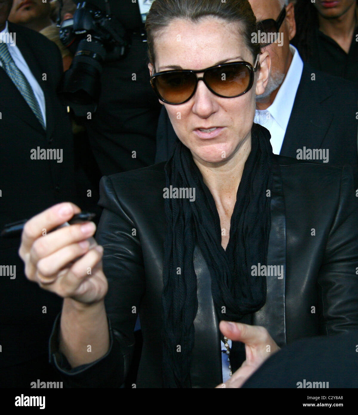 Dion Sign Celine Dion signs autographs for fans after leaving her Manhattan hotel ...