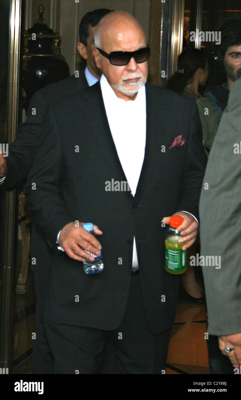 Rene Angelil leaving his Manhattan hotel with his wife New York City