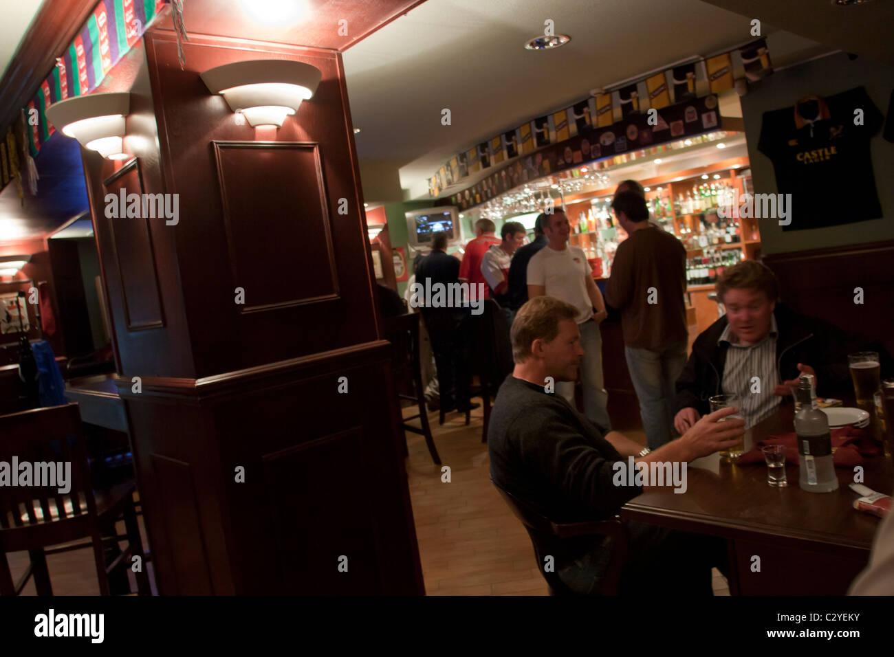 The interior of the Mishka Pub, a British style pub popular with expatriates, in Yuzhno Sakhalinsk, Sakhalin, Russia Stock Photo