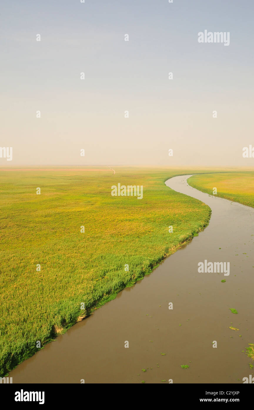 Bahr el Jabal near to Lake Nou with exploration road heading into swamp, Northern Sudd, South Sudan Stock Photo