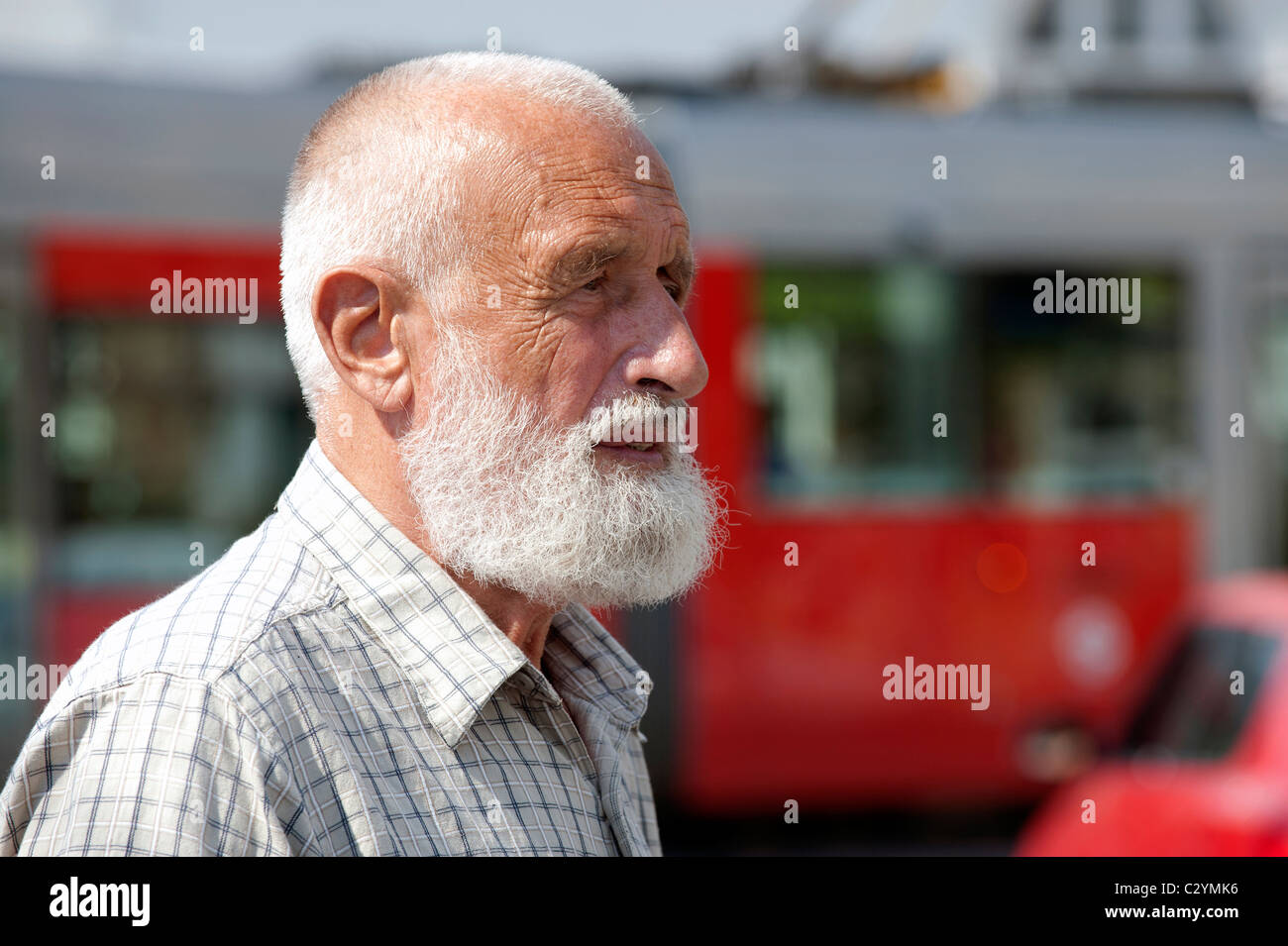 A portrait of older sun tan man with gray beard Stock Photo