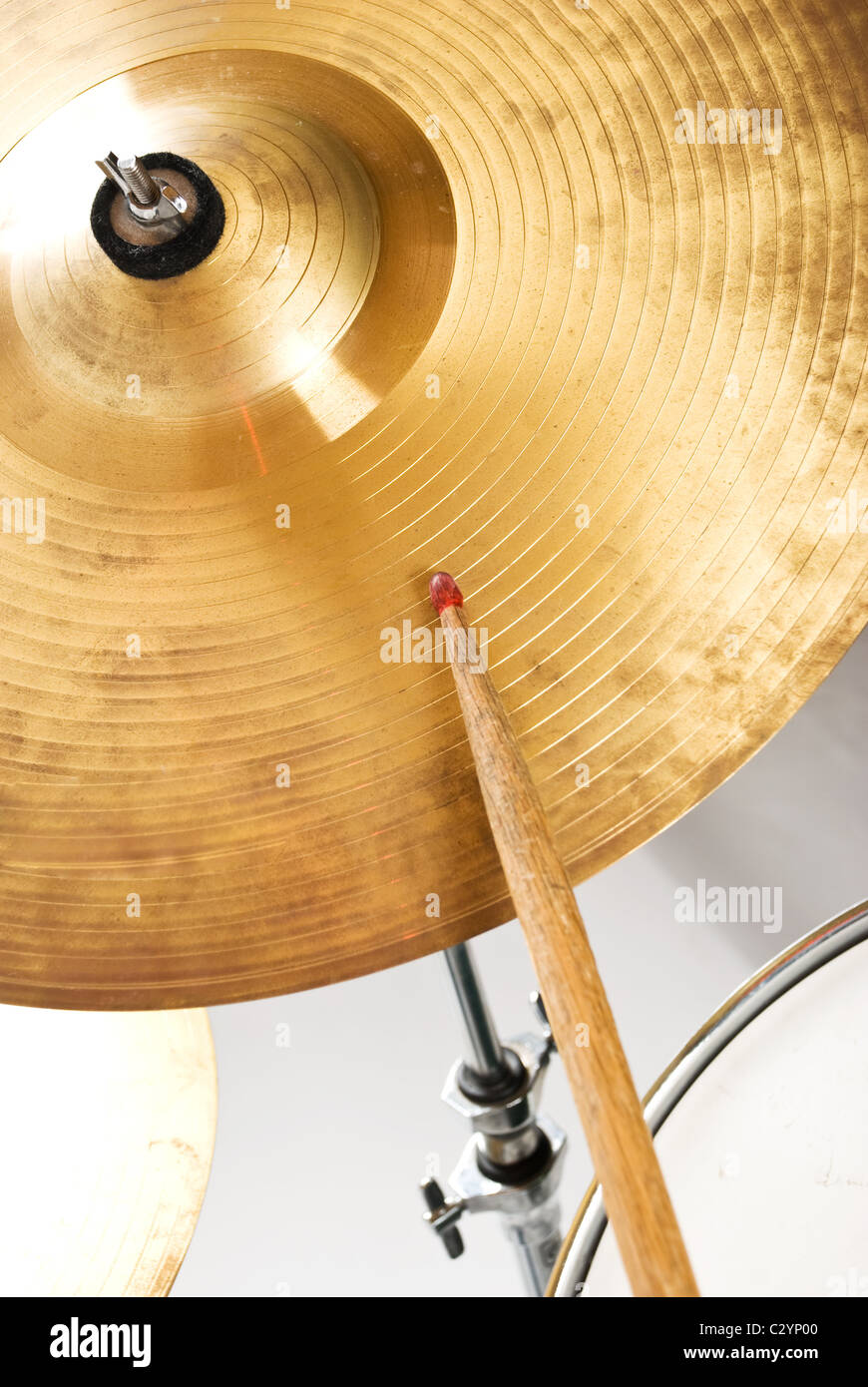 Close up of cymbal set and drumstick indoor shot Stock Photo