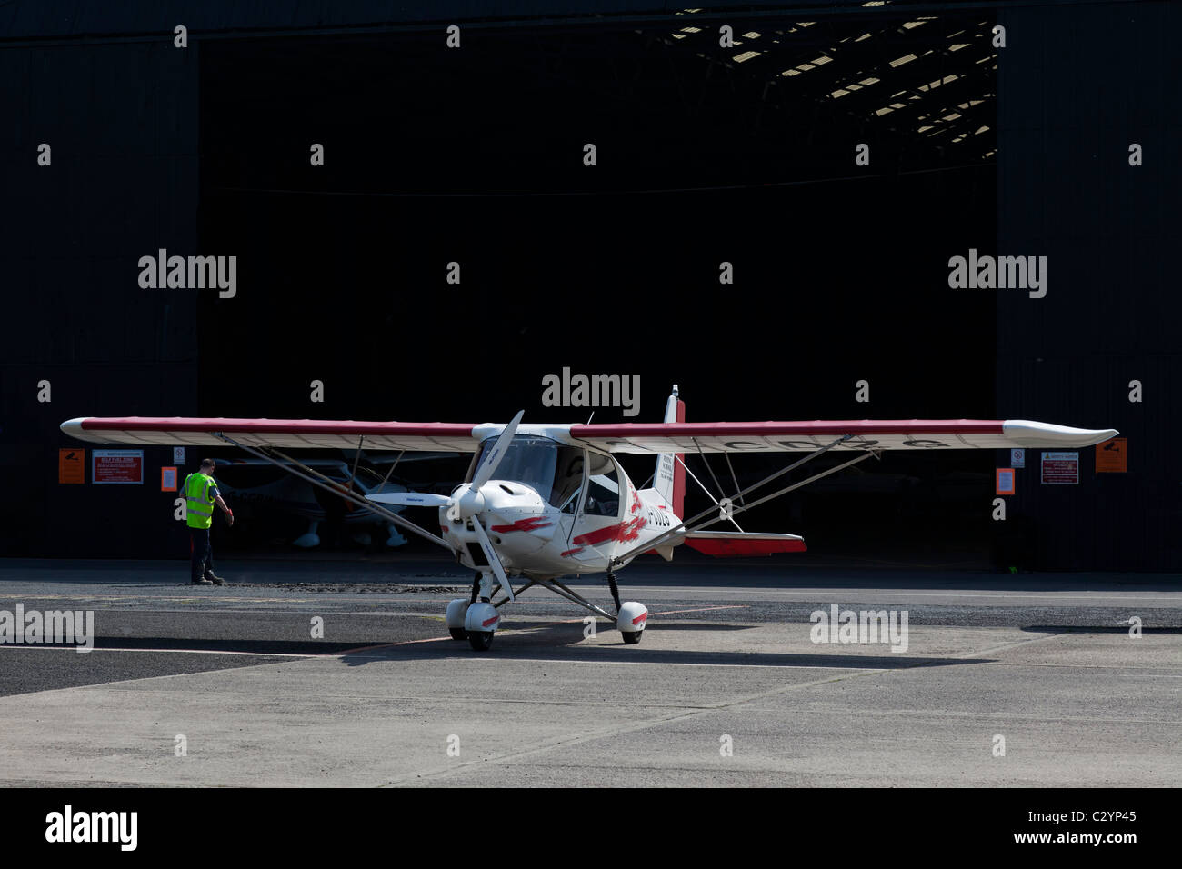 Ikarus C42 FB80, reg G-CDZG belonging to Manair Microlight Flying School, at Barton Airfield, Manchester Stock Photo