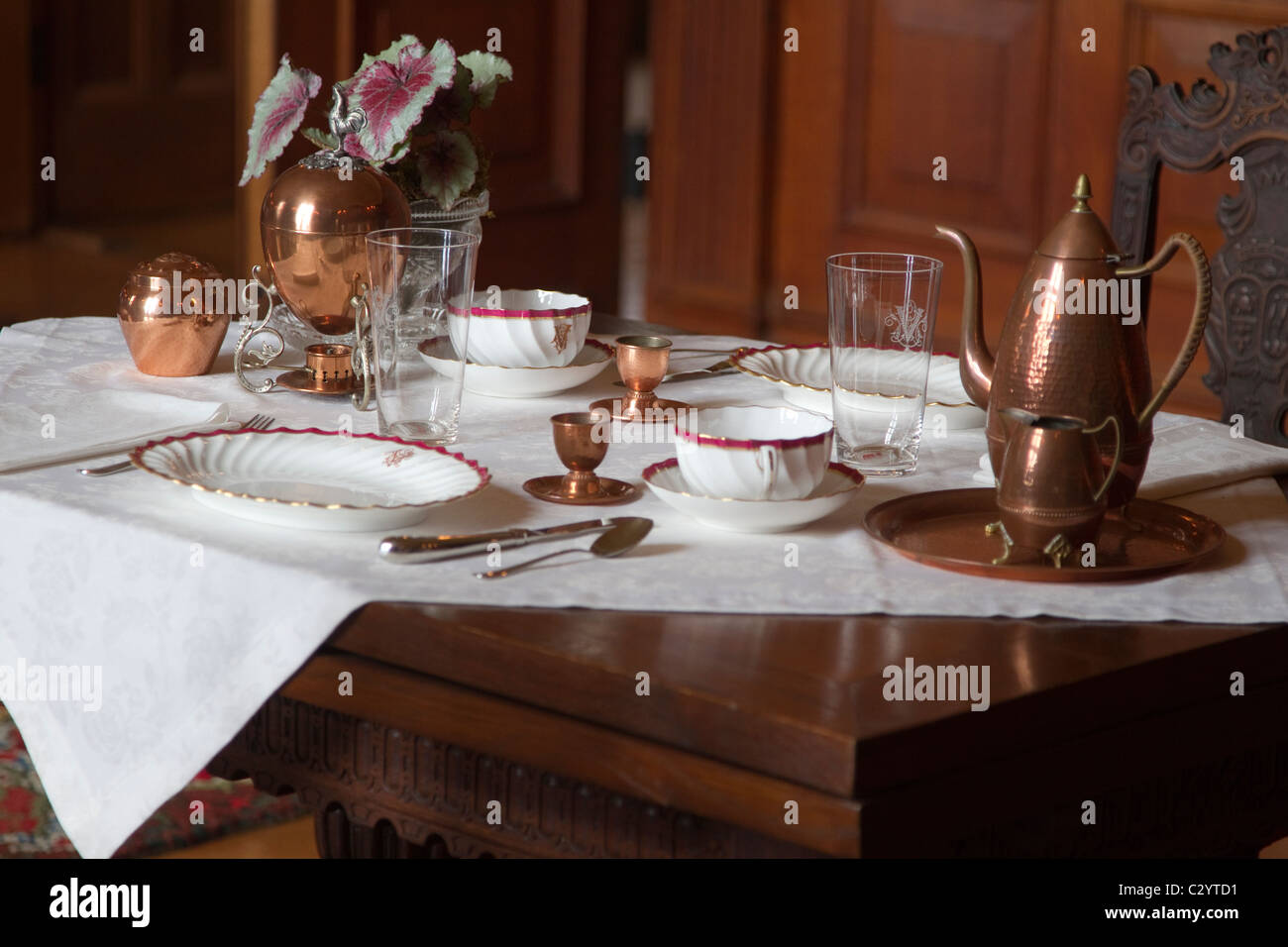 Typical place setting from the early twentieth century Stock Photo