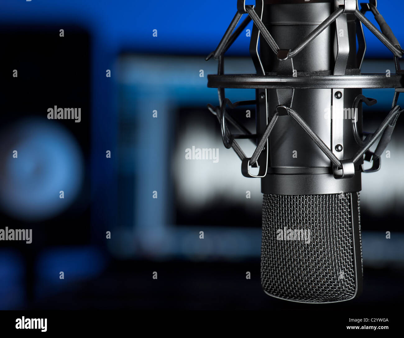 Microphone in the  music recording studio , focus on the microphone, for music production,audio,entertainment themes Stock Photo