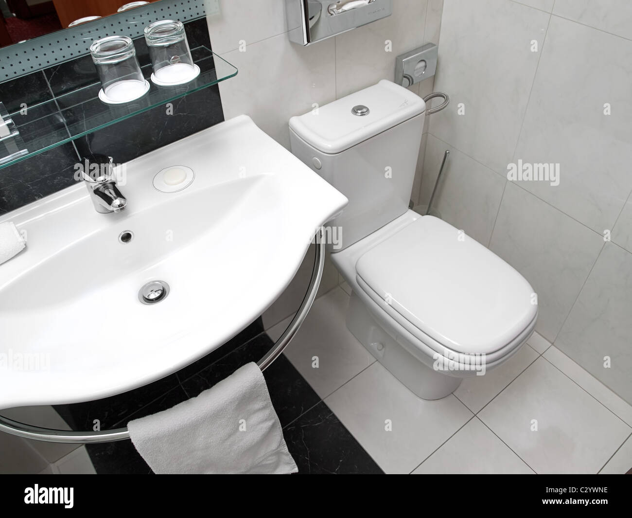 clean toilet and the bathroom sink Stock Photo Alamy